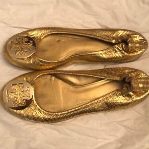 Tory Burch gold skin ballet flats